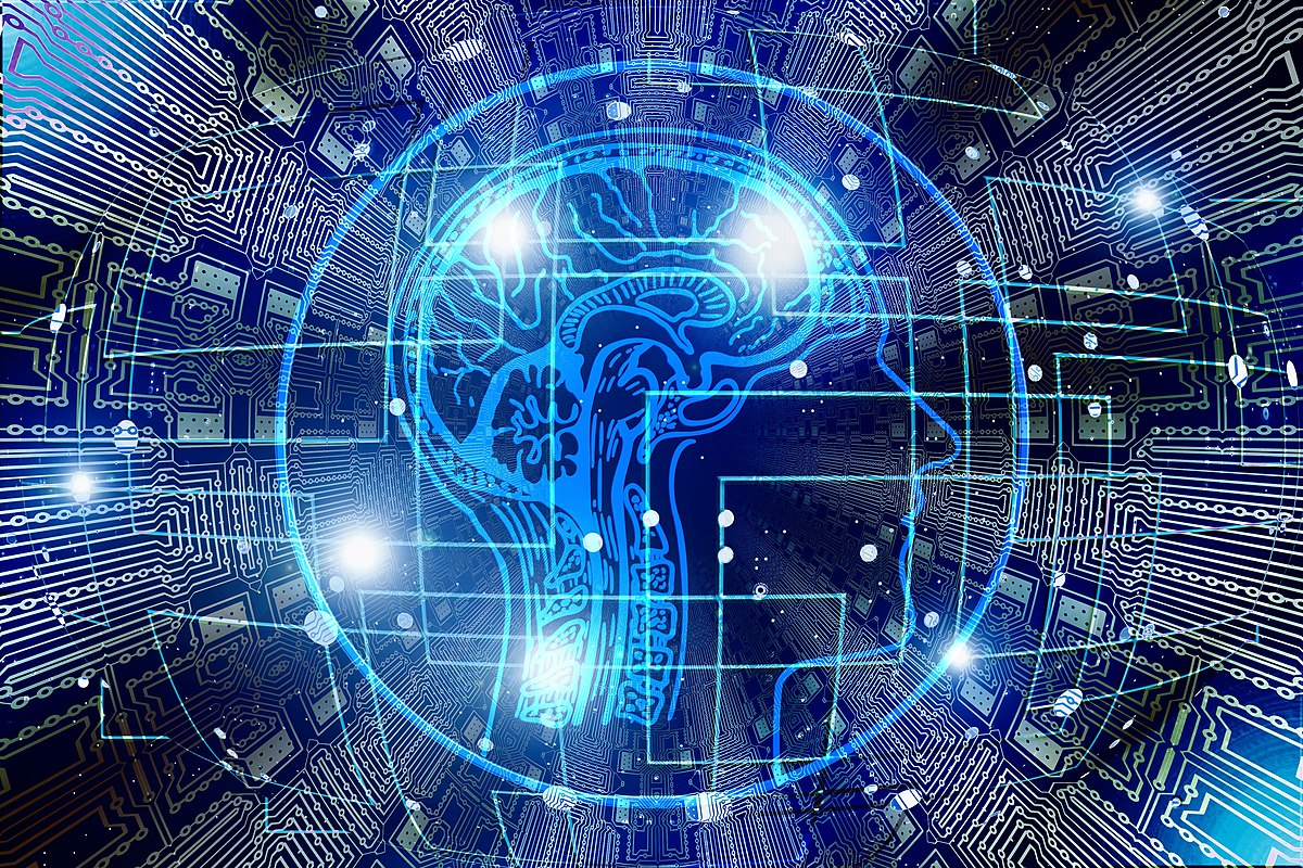 Image of circuitry and human brain outline symbolizing "artificial intelligence"