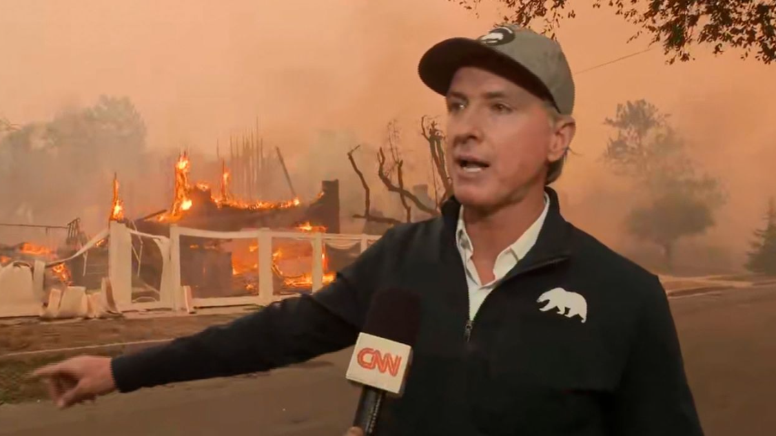 CA governor Gavin Newsom speaking to CNN amid smoke from wildfires