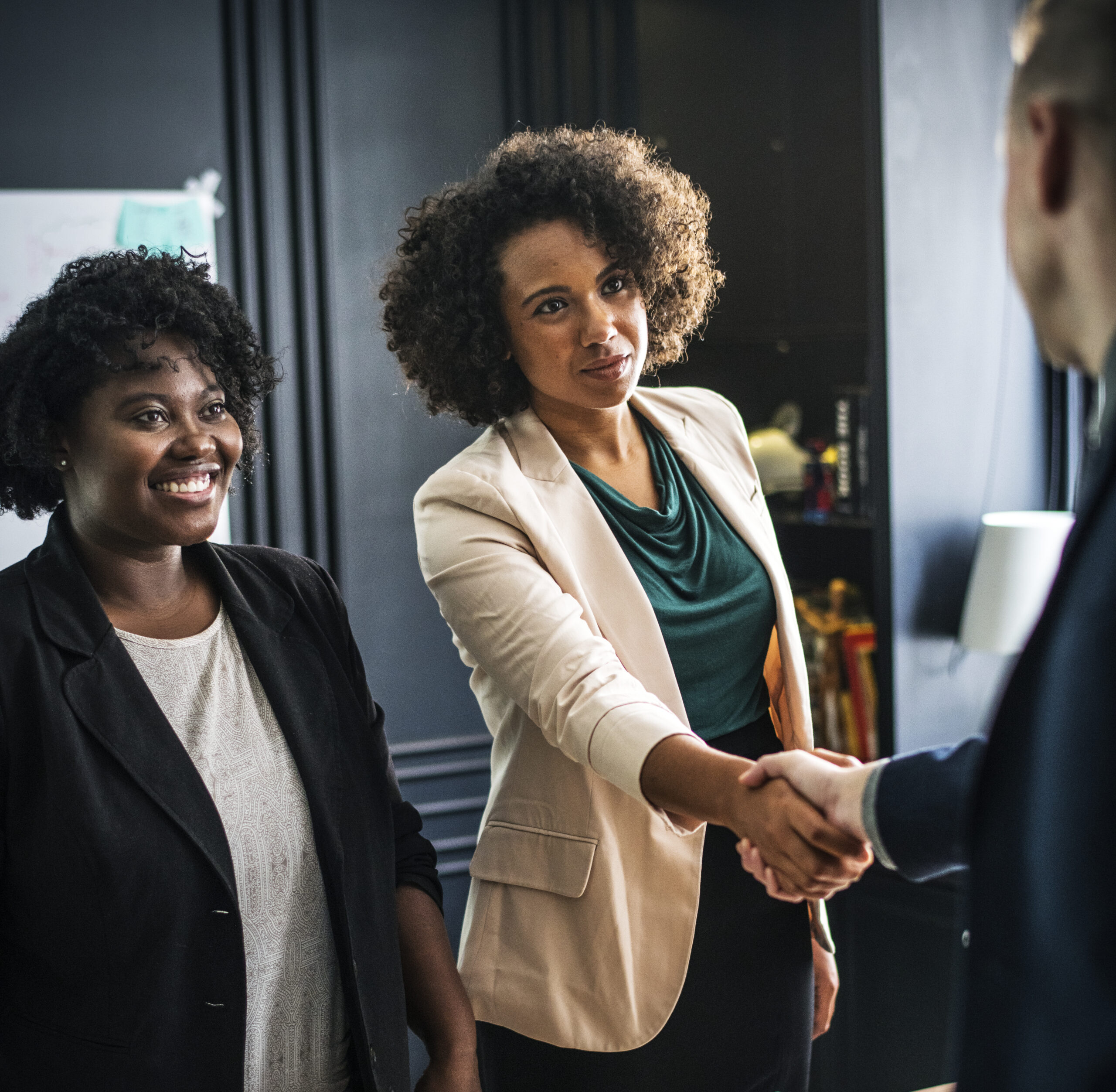 Woman executive shaking hands