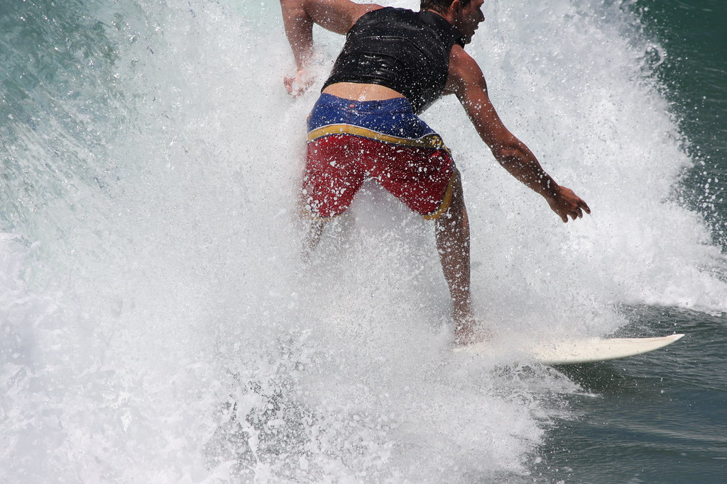 Surfer staying ahead of wave