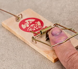 Thumb landing in mousetrap