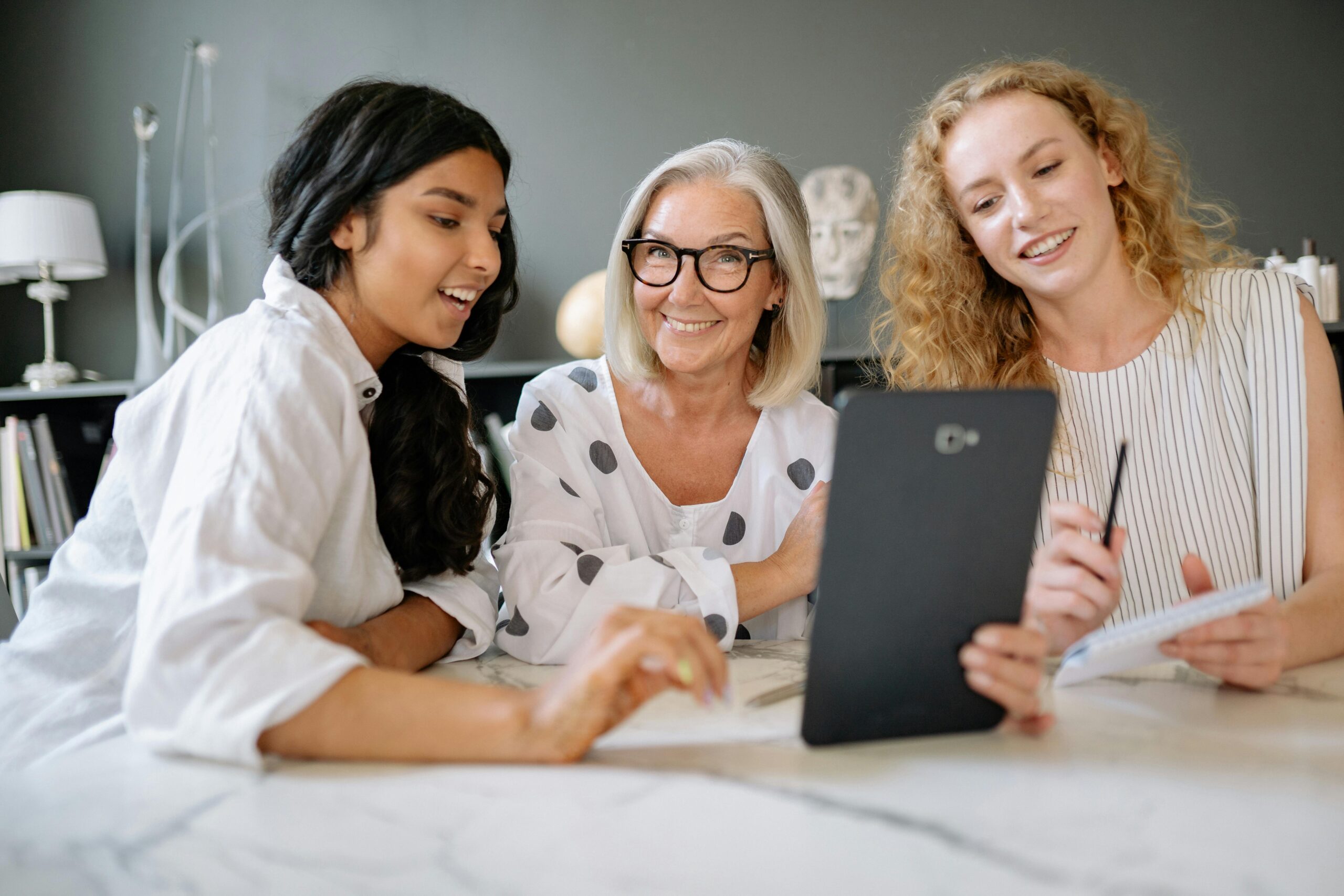 Three women colleagues of different ages and backgrounds