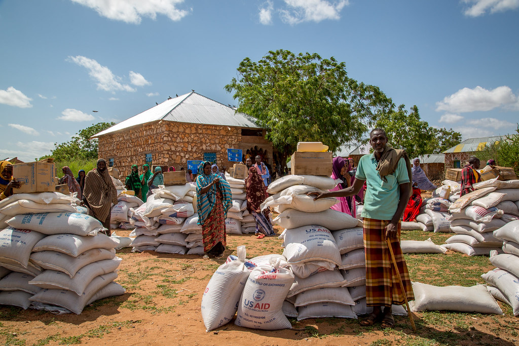 Sacks of food aid with USAID logo being distributed in Ethiopia