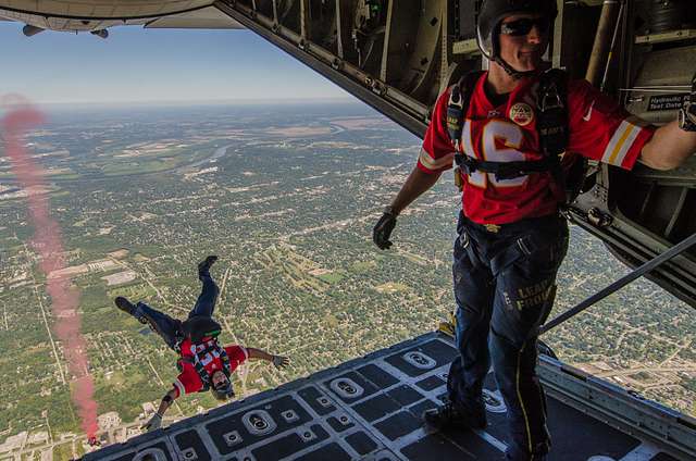 Skydiver leaping from plane