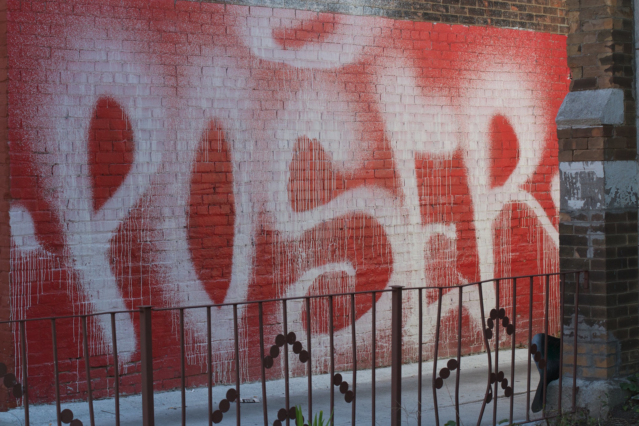 Photo of street art of the word "Poser"