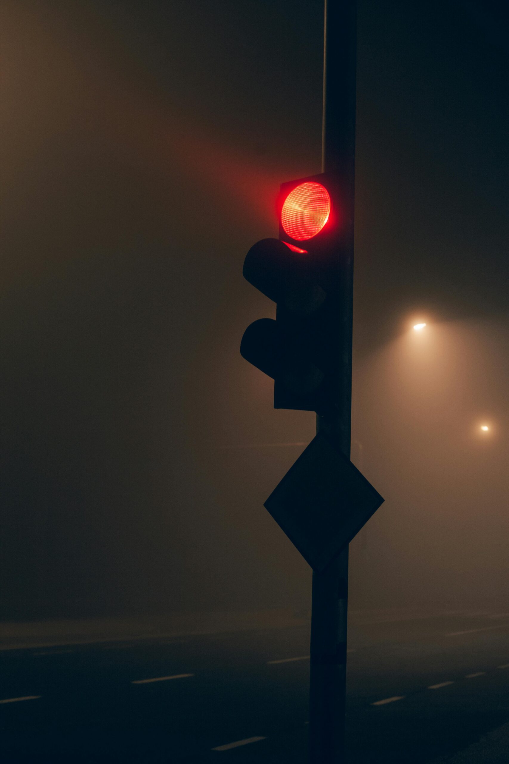 Stop light on a hazy night