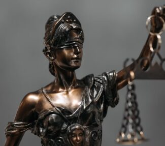 Statue of woman with scales of justice