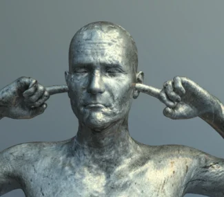 Statue of man with fingers in his ears