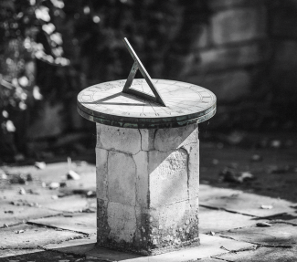 B&W image of ancient sundial